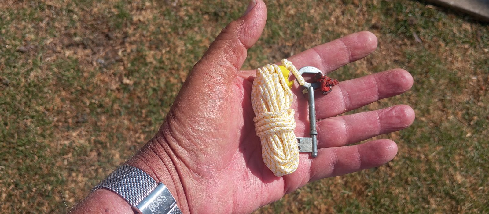 Hand holding a ViceTye with key